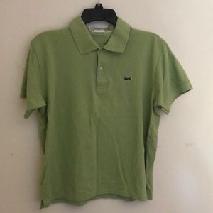 A green junior lacoste polo shirt